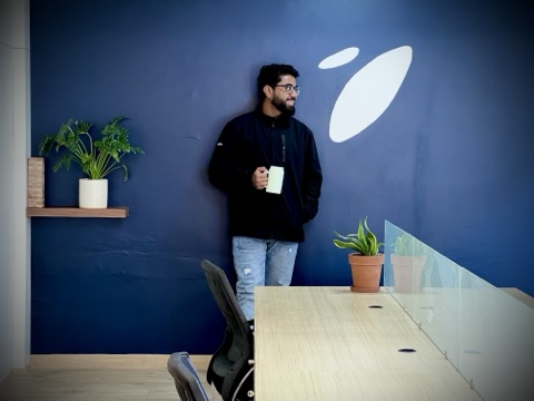 Rambabu Thapa standing in the Orka Socials office in Lalitpur.
