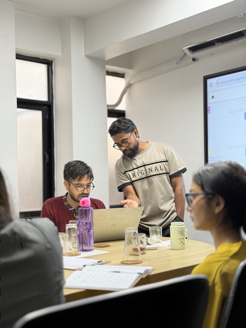 Students working through SEO project assignments at the Orka Socials Lalitpur office during a workshop.
